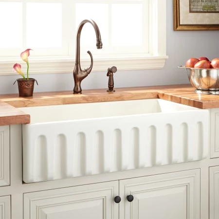 Signature Hardware Mitzy 36" Single Basin Fireclay Reversible Farmhouse Sink with Fluted Front